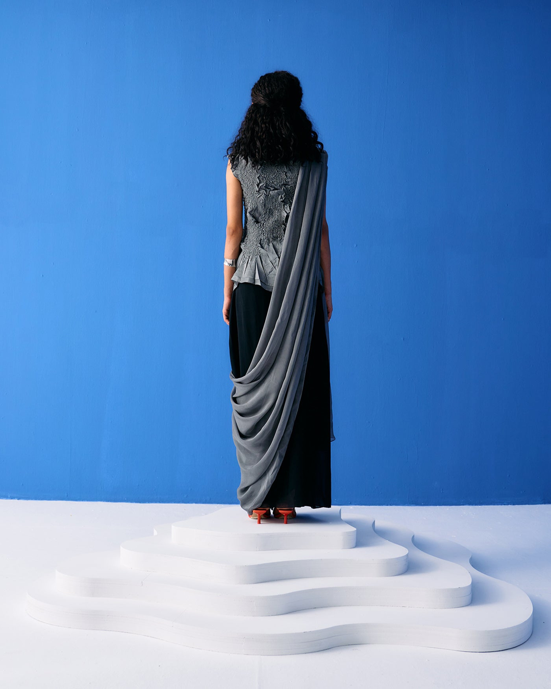 Grey Crinkled Top paired with Black & Grey saree